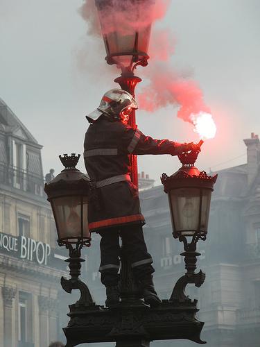 Paris fireman in middle of demonstration