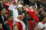 Des supporters de l'??quipe tunisienne, le 14 octobre au Stade de France. | AP/CHRISTOPHE ENA Des supporters de l'??quipe tunisienne, le 14 octobre au Stade de France.