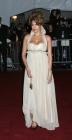 Eva Mendes extraordinaire dans une robe magnifique