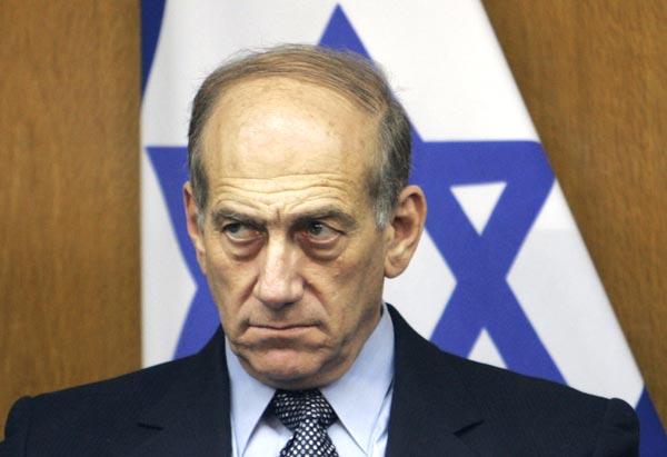 Colère au parlement britannique contre le boucher Ehud Olmert Colère au parlement britannique contre le boucher Ehud Olmert