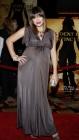 Milla Jovovich, enceinte, est radieuse