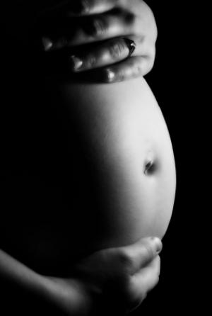 Un homme enceint de jumeaux Femme enceinte