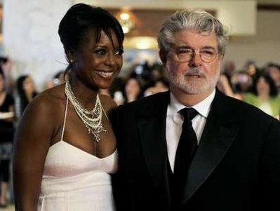 Film director George Lucas (R) and Mellody Hobson, president ...