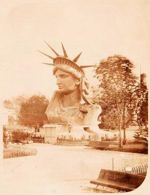 Head+of+the+Statue+of+Liberty+on+display+in+a+park+in+Paris.+Fernique,+Albert+--+Photographer.+1883