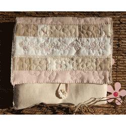 La rentrée loisirs créatifs chez Bouticréa Kits patchwork pochettes