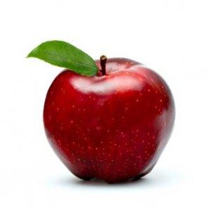 ripe red apple with green leaf isolated on white