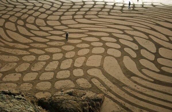 Andres Amador, peintre sur sable
