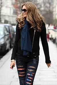 elle-macpherson-in-ripped-jeans-in-london-04