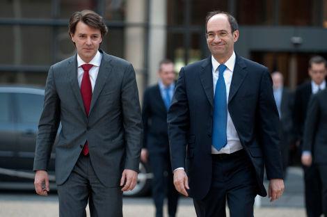 François Baroin et Eric Woerth, l'actuel et l'ancien ministre du Budget (Gonzalos Fuentes/Reuters).