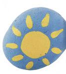 Une vague de gallets décorés soleil