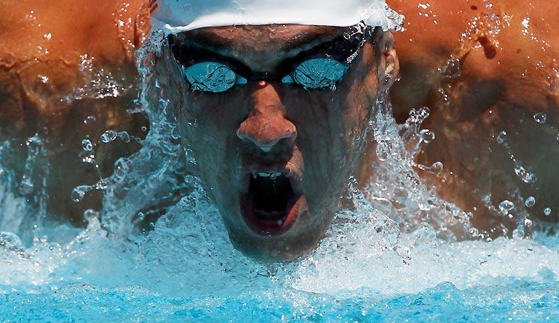 Michael Phelps, le champion aux quatorze titres olympiques, participe aux séries du 200 m papillon du championnat des États-Unis, à Irvine, en Californie, mercredi 4 août. Il y a déjà réalise un doublé 100 m nage libre et 200 m dos.