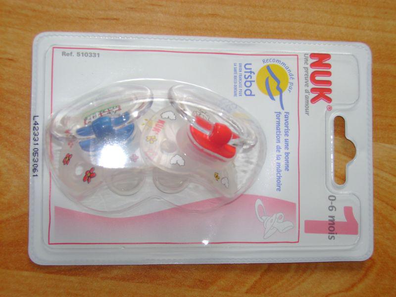 Donne lot de 2 totosses Nuk 0 à 6 mois neuves totosses nuk 0 à 6 mois neuves.jpg