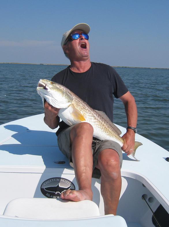 LA Redfish043 LOUISIANA REDFISH ON A FLY.