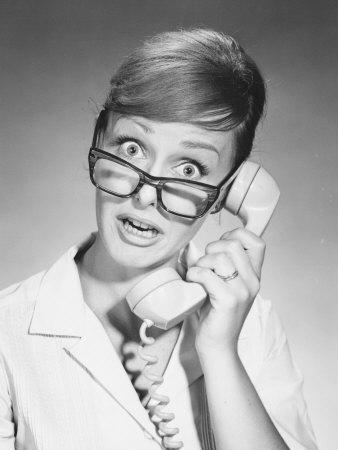 Woman with Glasses Using Telephone Photographie