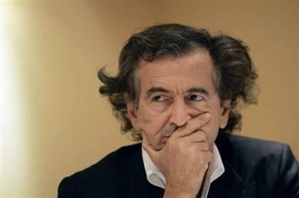 Nouveau scoop de mémé Kamizole : le « grave secret» de Kadhafi sur Sarkozy dévoilé ! bhl-penseur-decoiffe-decoiffant.1299958698.jpg
