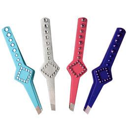 A la chasse au poil: quand la pince à épiler se fait belle! Pincetriangle.jpg