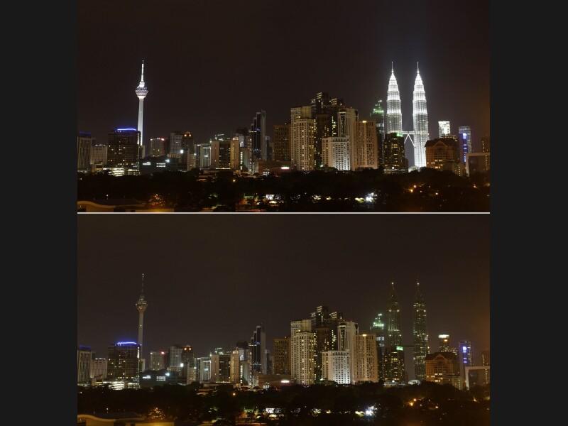 En Malaisie, la KL Tower (421 mètres, à gauche) et les tours jumelles Petronas (452 mètres, à droite) ont arrêté d'illuminer le paysage de Kuala Lumpur pendant une heure.