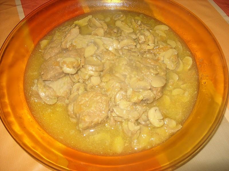Tajine de veau aux champignons, olives et c.confit