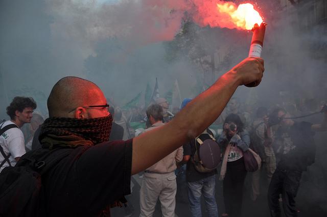 manifestants Le libéralisme, c’est la loi du plus fort