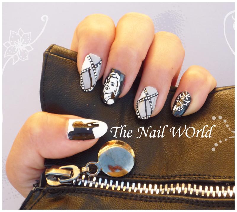 Marylin Monroe nail art http://img404.imageshack.us/img404/8257/marylin5.jpg