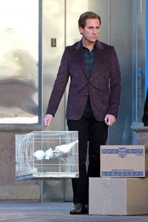 Steve_Carell_holds_cage_white_doves_continues_DIJAqre2vcJl.jpg