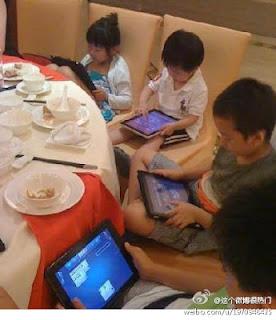 les enfants chinois et leurs tablettes tactiles