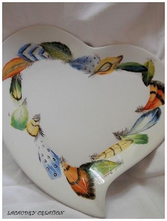 Peinture sur porcelaine , apres la chouette..... les plumes farandole d eplume porcelaine