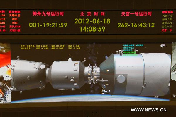 Shengzhou-9 Tiangong-1 La Chine réussit sa première mission d'amarrage habitée