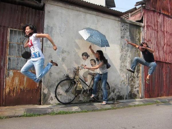 Ernest Zacharevic : le street art participatif Ernest Zacharevic : le street art participatif