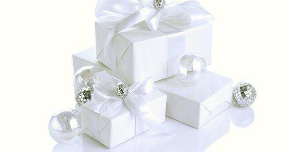 bunch of white and silver christmas presents