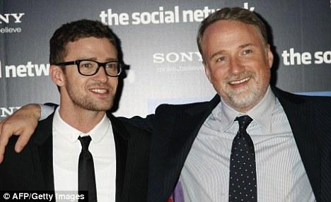 David Fincher à la réalisation du clip de Suit&Tie;? http://i.dailymail.co.uk/i/pix/2010/10/14/article-1320630-0B7676F6000005DC-526_468x286.jpg