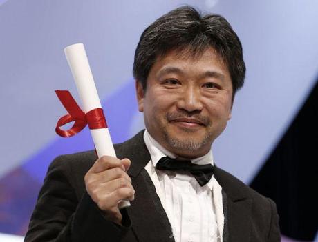 2445077_jury-price-award-winner-director-hirokazu-kore-eda-poses-after-being-awarded-during-the-closing-ceremony-of-the-66th-cannes-film-festival