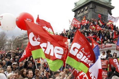 914065_demonstrators-attend-a-political-rally-at-bastille-place-to-support-jean-luc-melenchon-leader-of-france-s-parti-de-gauche-political-party-and-the-front-de-gauche-political-party-s-candidate-for