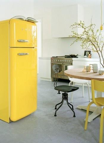 We're all about modern, but we sure do love a vintage (or vintage inspired!) piece here and there. Like this awesome yellow fridge :) #decor #kitchen #design #interiordesign