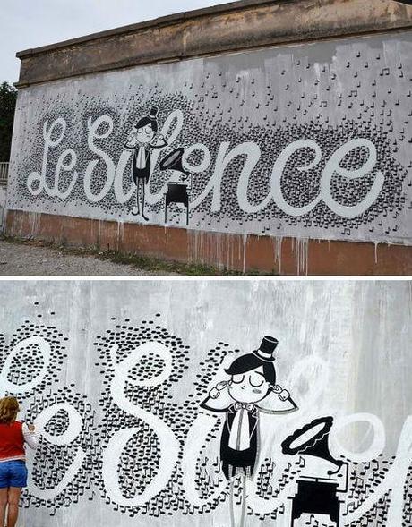 Using street art to make a statement has been done. But using hundreds, if not thousands, of musical notes? Well, that's a new one. Milan-based street artist Eme forms the phrase “Le Silence