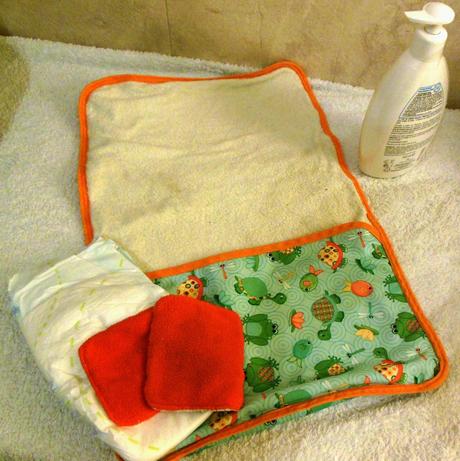 Le tapis à langer nomade Le tapis à langer nomade