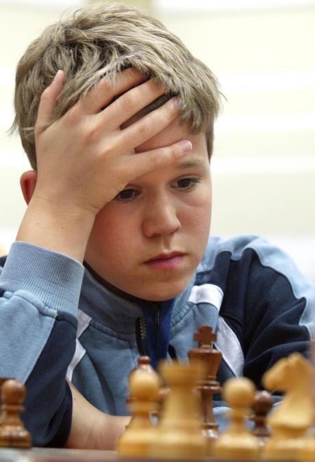 429795-13-year-old-norwegian-magnus-carlsen-concentrates-during-a-match-with-.jpg