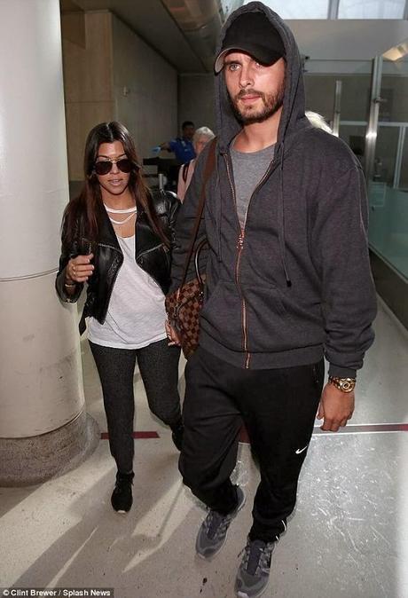 Kourtney Kardashian et Scott Disick à l'Aéroport LAX de Los Angeles - 02.12.2013