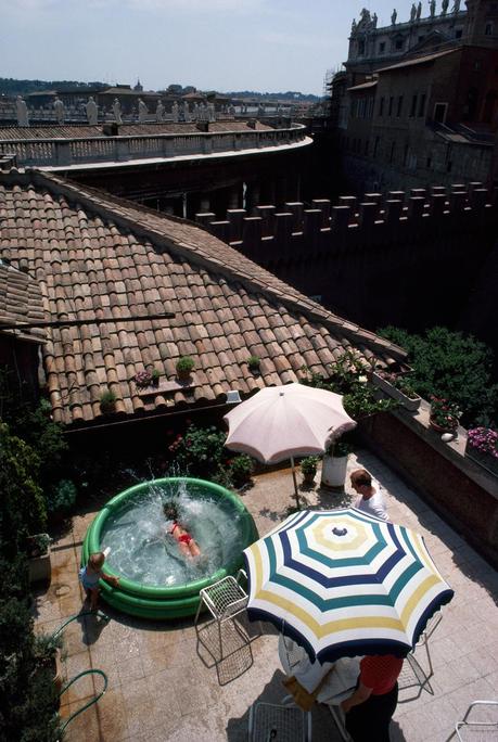 A married Swiss Guard and his family enjoy a patio pool at their compound in Vatican City, 1985.Photograph by James L. Stanfield, National Geographic