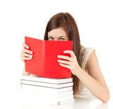 Ashamed student girl covering face book Royalty Free Stock Photo