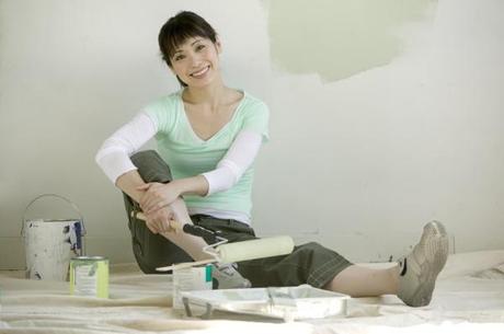 Woman Painting Wall