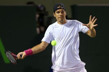 Le catogan, la solution capillaire des sportifs aux cheveux longs? 577289_le-tennisman-americain-tommy-haas-le-27-mars-2013-au-tournoi-de-miami