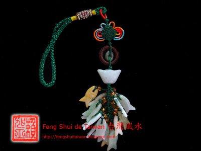 Les amulettes porte-bonheur avec un lingot Chinois