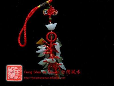 Les amulettes porte-bonheur avec un lingot Chinois