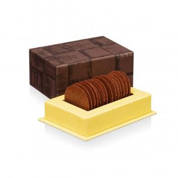 Gourmandise : Les galets Mogador de Pierre Hermé Ganache au chocolat au lait et au fruit de la Passion, chocolat au lait.