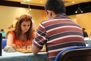 Ni Hua (2674) 1/2 Evgeniya Doluhanova (2334) - Photo © Chess & Strategy  