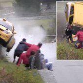 Rally fans cheat death by inches as vehicle flips over them