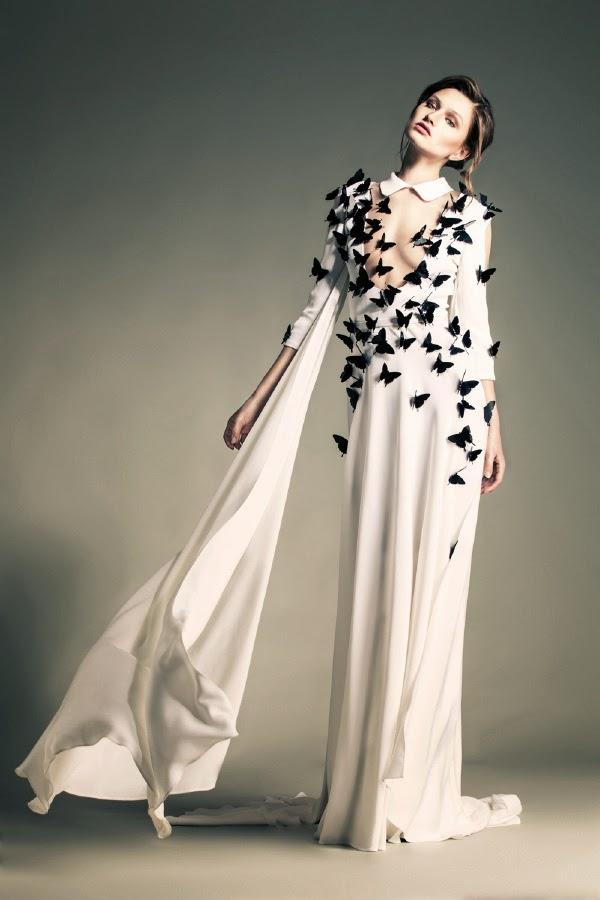 haute couture défilé de mode sabaji styliste libanais , robe blanche incroyable avec des papillons sculptés