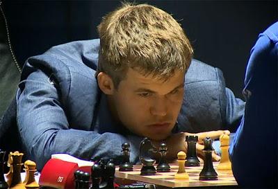Partie 5 : Magnus Carlsen annule avec les Noirs au championnat du monde d'échecs 2014 © Chess & Strategy
