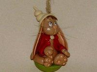 Suspension avec lapin aux couleurs de Noël en porcelaine froide Suspension avec lapin aux couleurs de Noël en porcelaine froide